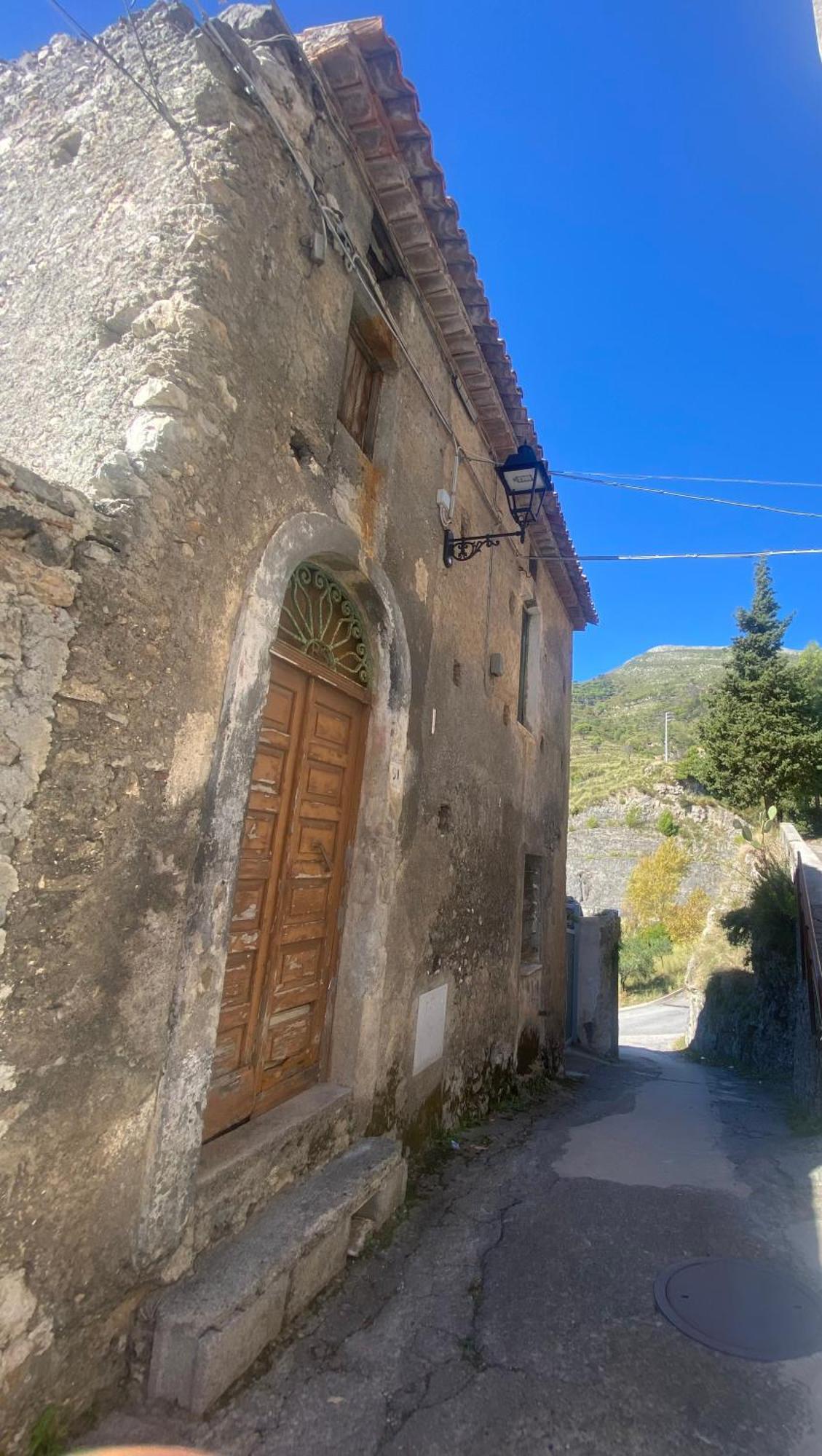 Отель La Terrazza Nel Borgo Тортора Экстерьер фото